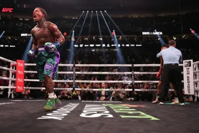 Gervonta Davis lands a powerful punch during a high-stakes boxing match